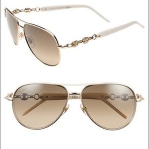 White and gold Gucci sunglasses